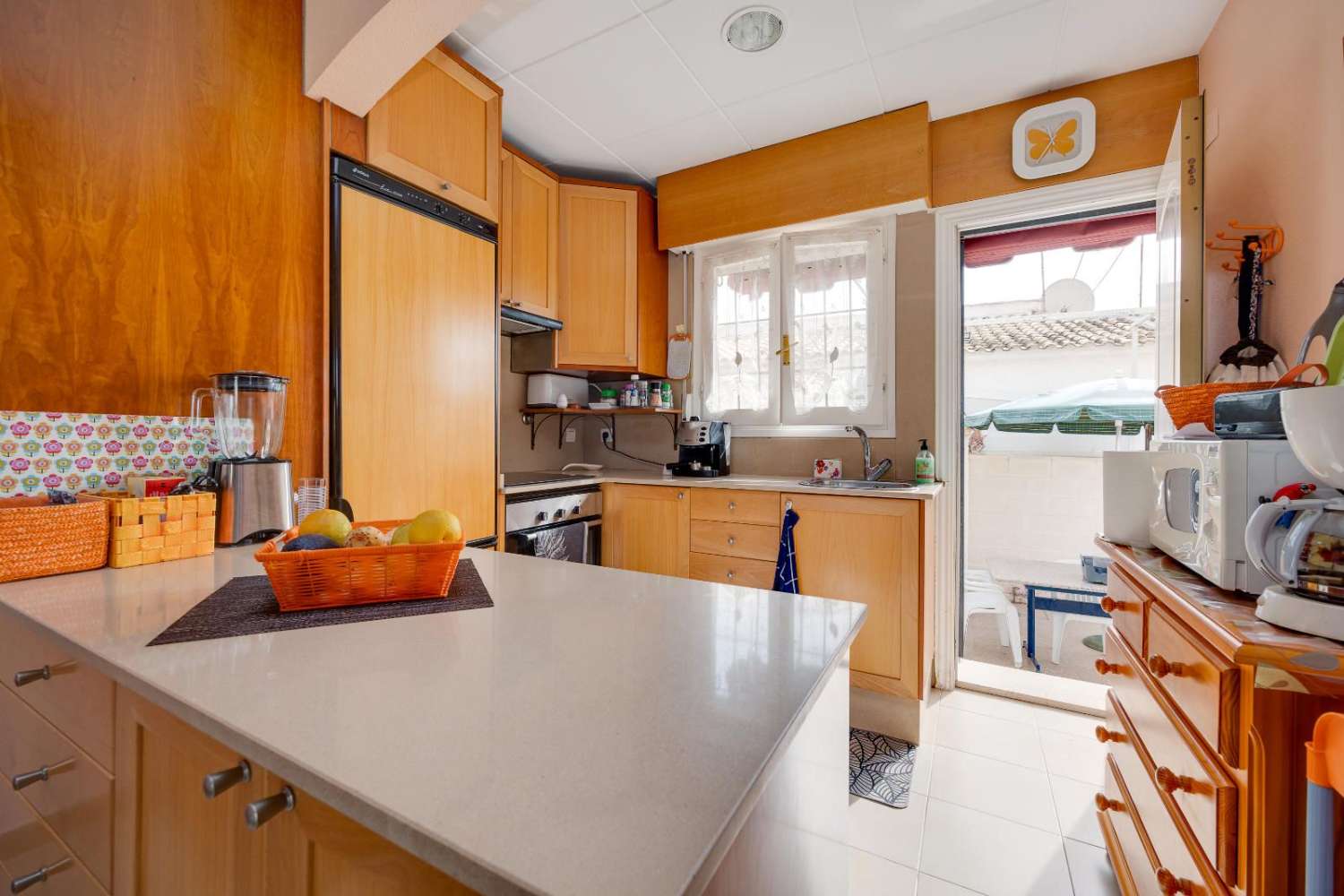 Acogedora casa adosada con una pequeña parcela en Orihuela Costa