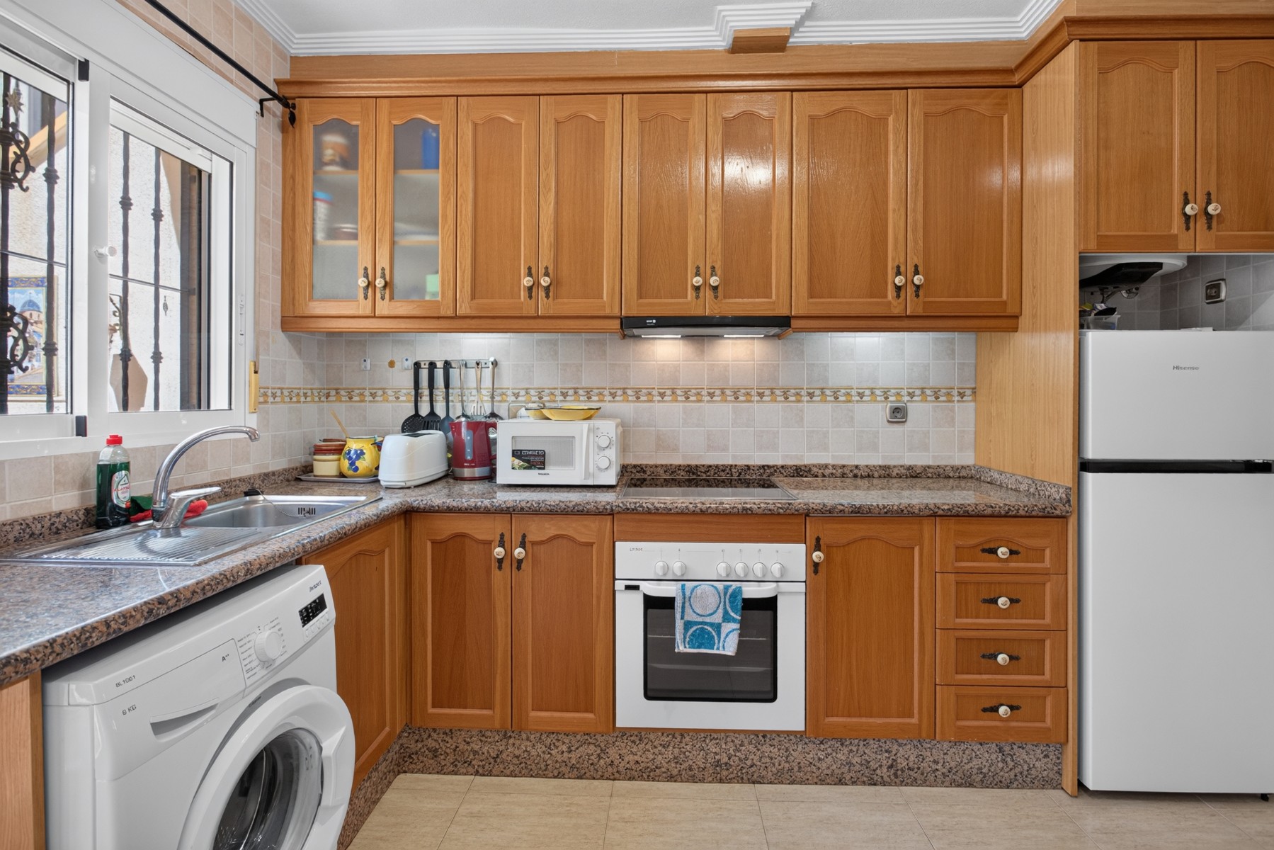 SINGLE-LEVEL 2-BEDROOM TOWNHOUSE WITH 2 TERRACES AND 55 M² PRIVATE SOLARIUM – LOS DOLSES / VILLAMARTÍN, ORIHUELA COSTA