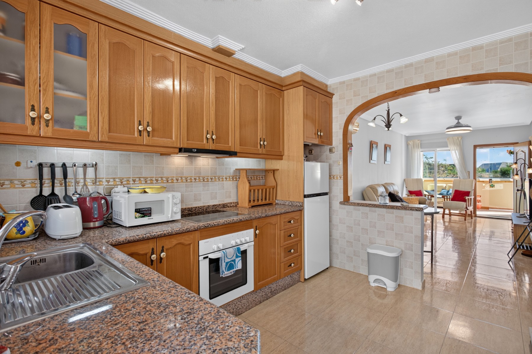 SINGLE-LEVEL 2-BEDROOM TOWNHOUSE WITH 2 TERRACES AND 55 M² PRIVATE SOLARIUM – LOS DOLSES / VILLAMARTÍN, ORIHUELA COSTA