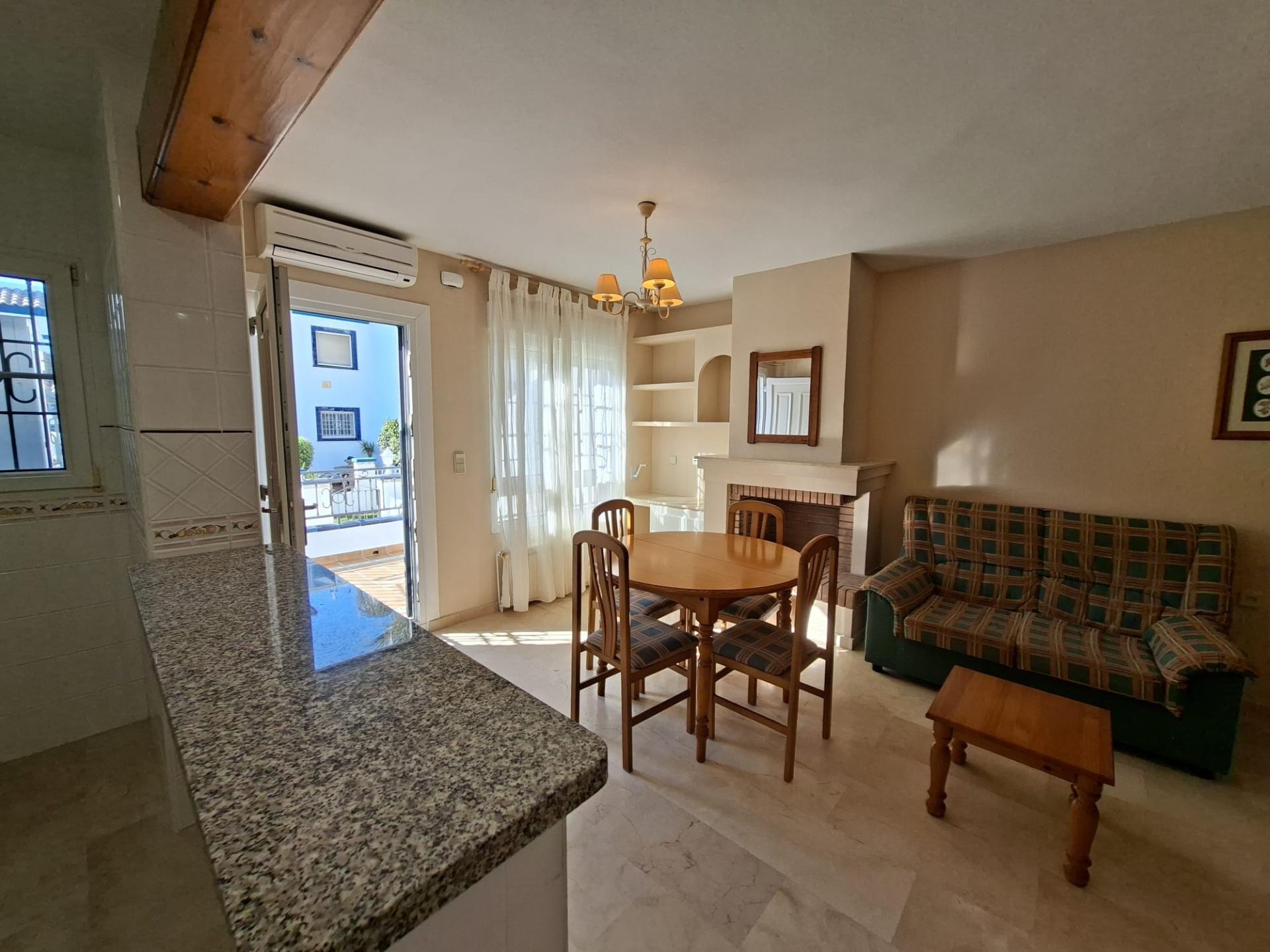 RENOVATED 2-BEDROOM TOWNHOUSE BUNGALOW WITH PRIVATE GARDENS, FIREPLACE AND 36.67 M² SOLARIUM – ORIHUELA COSTA